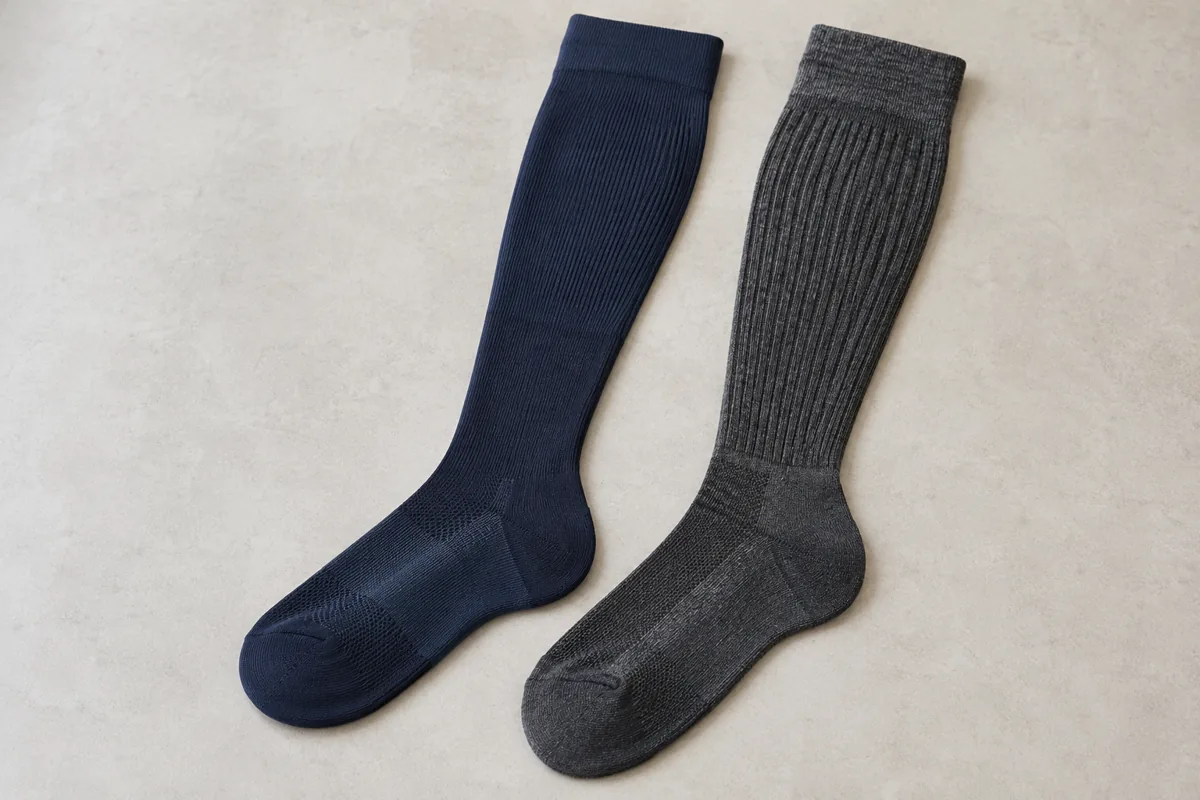Two knee-high sock samples illustrating different knit constructions